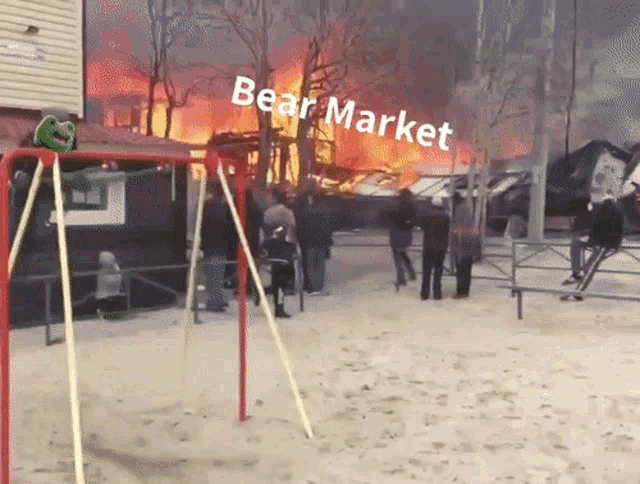 a group of people standing in front of a burning building with bear market written on the ground