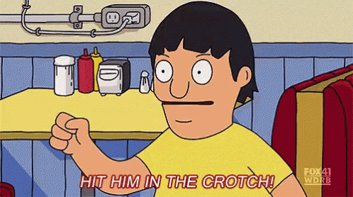 a cartoon character says hit him in the crotch while sitting at a table