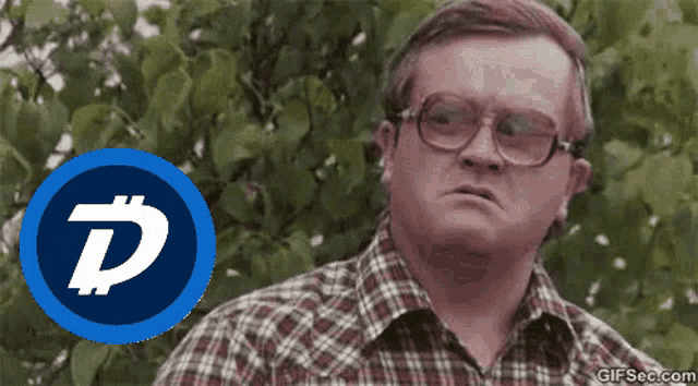 a man wearing glasses and a plaid shirt stands in front of a blue circle with a letter d on it