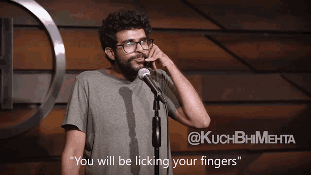 a man speaking into a microphone with the words " you will be licking your fingers "