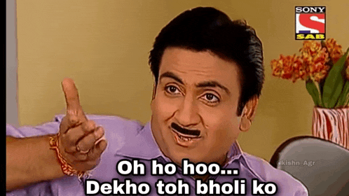 a man with a mustache is pointing and says oh ho hoo dekho toh holi ko