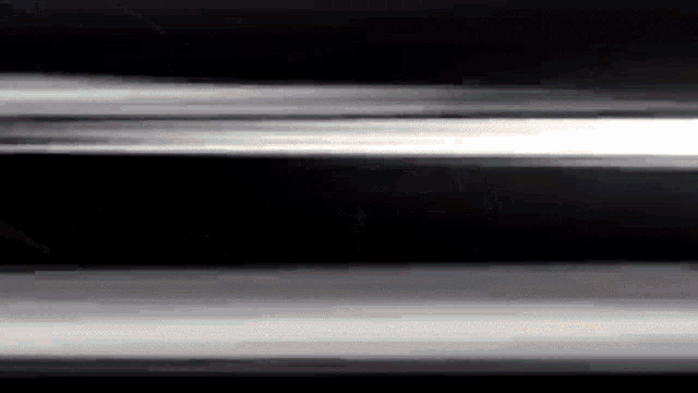 a black and white striped background with a few white lines