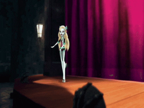 a monster high doll dancing on a stage