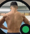 a shirtless man is standing with his hands on his hips in a circle .