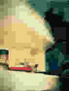 a pixelated image of a person 's face with a red ribbon around their mouth