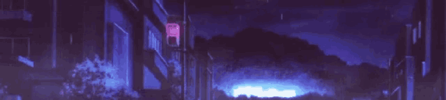 a telephone booth is lit up at night in a dark alleyway