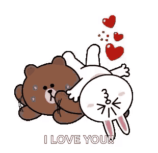 a brown bear and a white rabbit are laying next to each other .