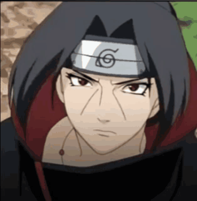 a close up of a person wearing a headband with a symbol on it