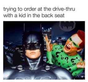 a picture of batman and the riddler with the caption trying to order at the drive thru with a kid in the back seat