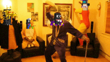 a man with a cane is dancing in a room