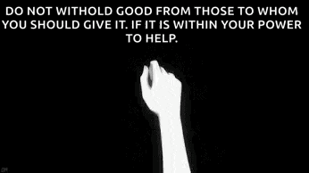 a couple of hands holding each other in a black and white photo .