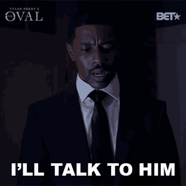 a man in a suit and tie is saying " i 'll talk to him "