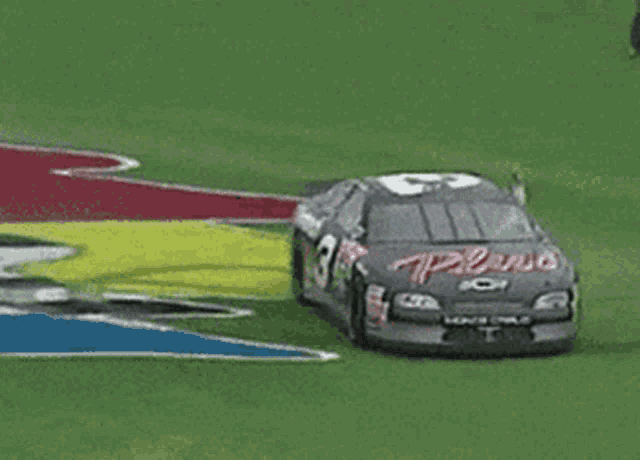 a race car with the number 3 on the side of it