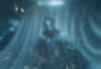 a man wearing a fur coat is dancing in front of a curtain