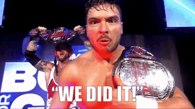 a man holding a wrestling championship belt with the words " we did it " below him