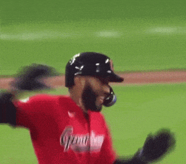 a baseball player wearing a red uniform with the number 41 on it