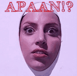 a close up of a woman 's face with the word apaan written above it
