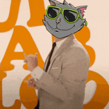 a man wearing a suit and tie with a cat mask on his face