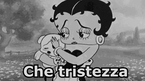 betty boop is holding a sad dog in her arms in a black and white photo .