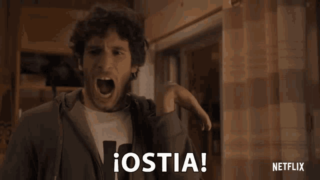 a man in a hoodie is screaming with the word iostia written on the bottom