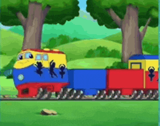 a blue yellow and red train with monkeys on the side