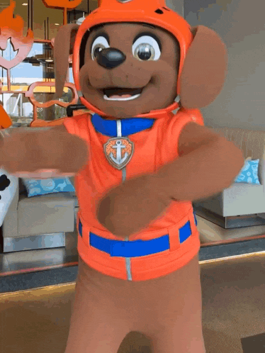 a stuffed animal wearing a paw patrol costume