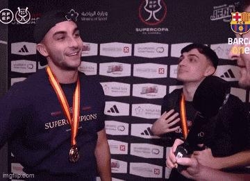 a man with a medal around his neck that says superchampions on it