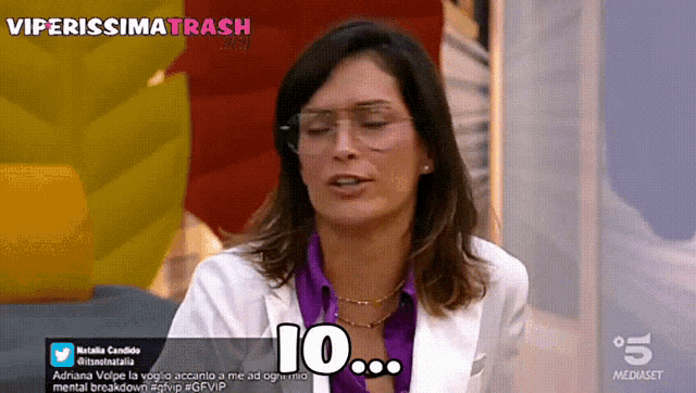 a woman wearing glasses and a white jacket says " 10 "