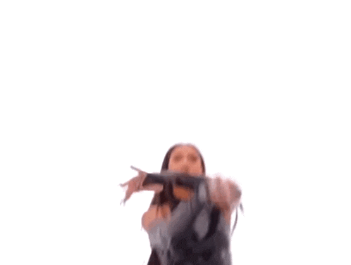 a woman in a black latex dress is making a hand gesture