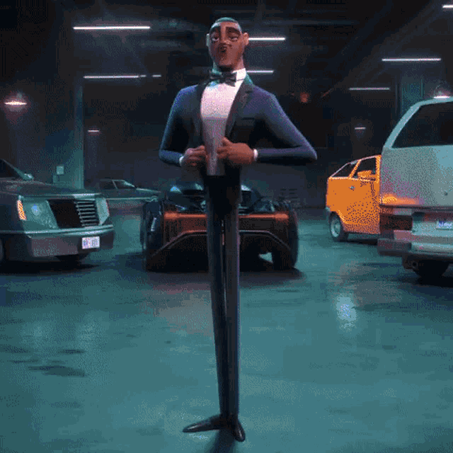 a man in a tuxedo and bow tie is standing in a parking garage
