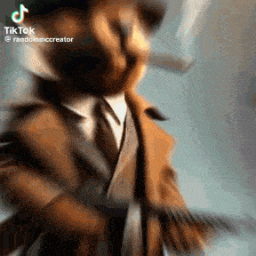 a cat wearing a suit and tie is dancing .