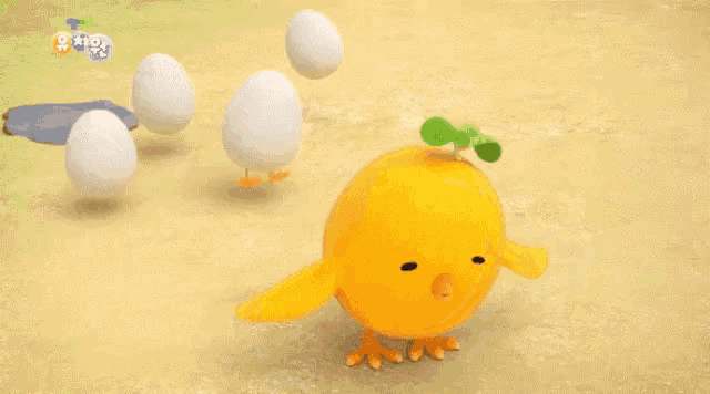 a yellow chick with a green plant on its head is standing in front of eggs