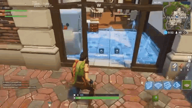 a person in a video game is standing in front of a glass door ..