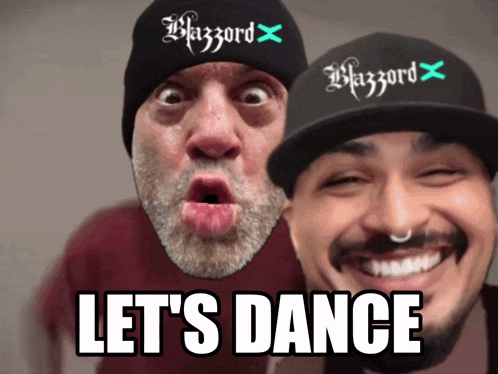 two men wearing hats that say blazzard are smiling and making funny faces