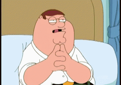 peter griffin from family guy is sitting on a bed with his hands together