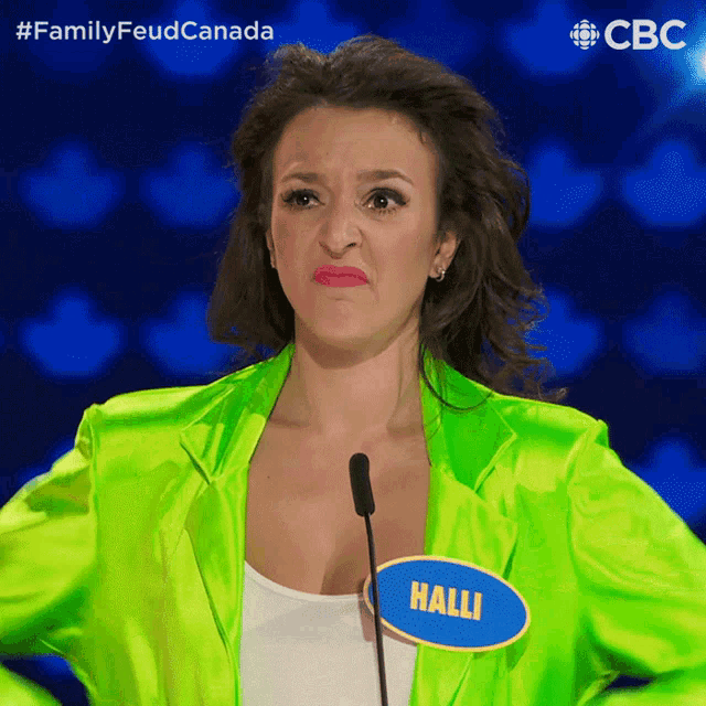 a woman wearing a neon green jacket has a name tag that says halli