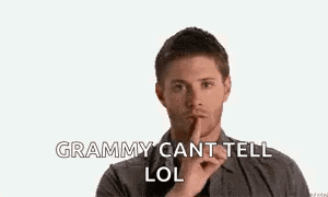 a man is making a funny face and saying `` grammy can t tell lol '' .