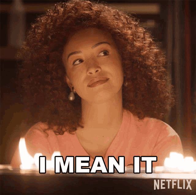 a woman with curly hair says " i mean it " in a netflix ad