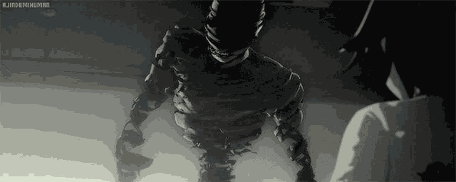 a black and white drawing of a monster standing next to a person