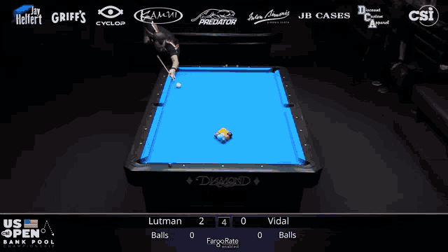 a pool table with a blue cloth and the word diamond on it