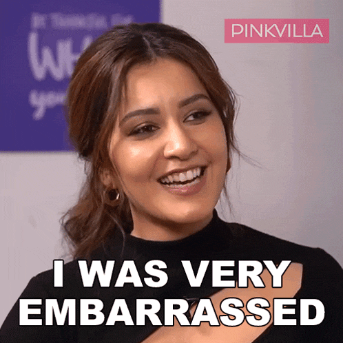 a woman is smiling with the words i was very embarrassed behind her