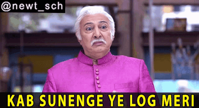 a man in a pink shirt with the words kab sunenge ye log meri written below him