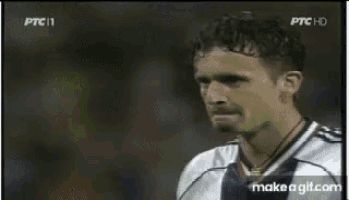 a soccer game is being played on a field with advertisements for casio and gillette