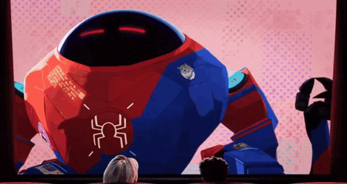 a robot with a spider on it 's chest is being shown on a screen