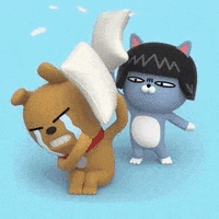 a dog is crying while a cat is holding a pillow .