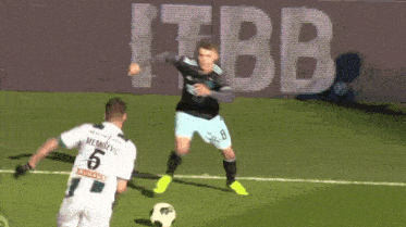 a soccer player with the number 6 on his back