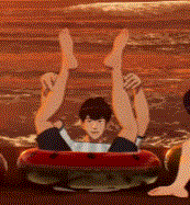 a man is laying on his back in a raft with his legs in the air .