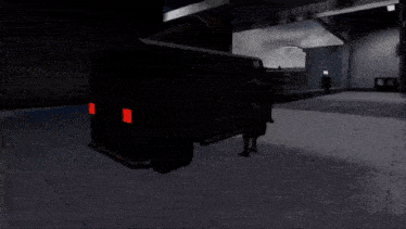 a black truck with red lights on the back is driving through a dark hallway