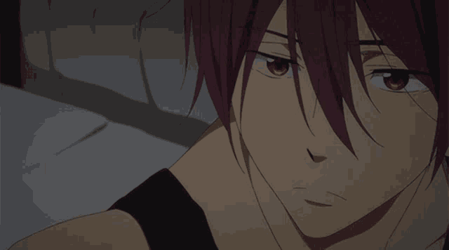 a close up of a person 's face with red hair