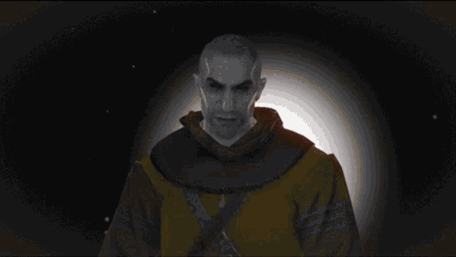 a man in a hooded jacket is surrounded by red lights